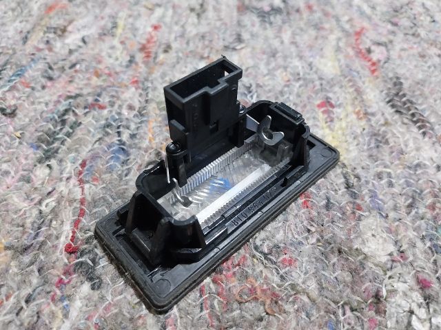 bontott AUDI A4 B8 Bal Rendszámtábla Világítás