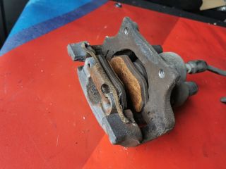 bontott BMW 3 E91 Bal hátsó Féknyereg Munkahengerrel