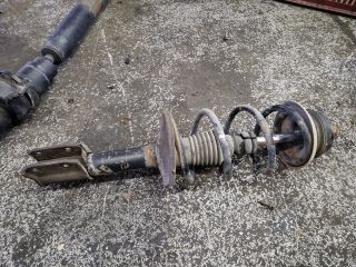 bontott DACIA LOGAN Jobb első Gólyaláb (Lengécsillapító, Rugó)