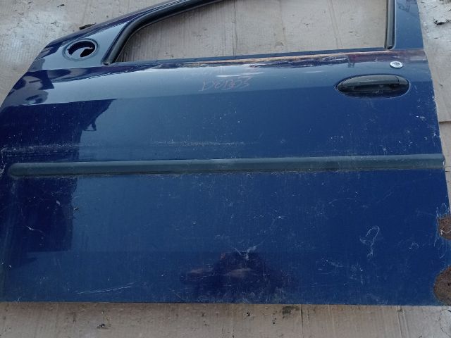 bontott DACIA LOGAN Bal első Ajtó Díszléc