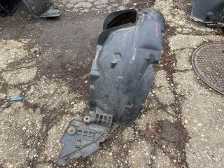 bontott DACIA LOGAN Bal első Dobbetét (Kerékjárati, Műanyag)