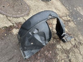 bontott DACIA LOGAN Bal első Dobbetét (Kerékjárati, Műanyag)