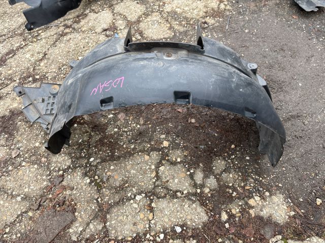 bontott DACIA LOGAN Bal első Dobbetét (Kerékjárati, Műanyag)