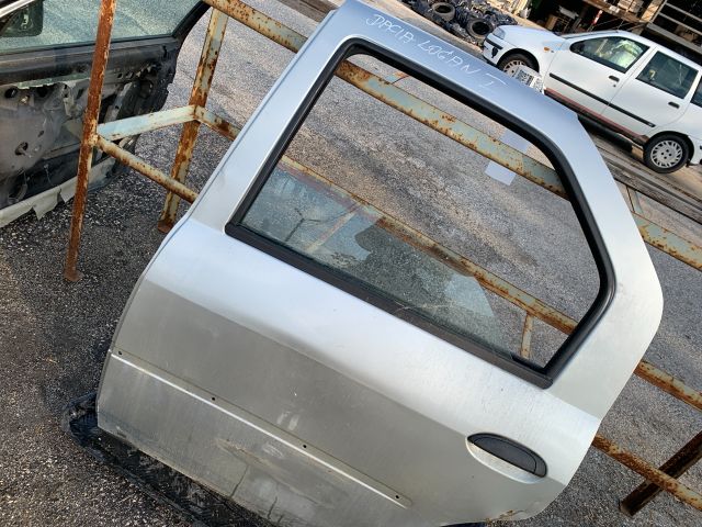 bontott DACIA LOGAN Bal hátsó Ajtó (Részeivel)