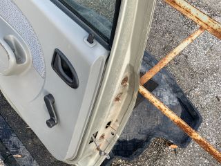 bontott DACIA LOGAN Bal hátsó Ajtó (Részeivel)
