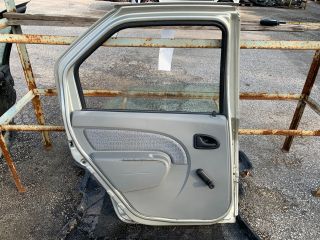 bontott DACIA LOGAN Bal hátsó Ajtó (Részeivel)