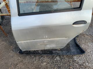 bontott DACIA LOGAN Bal hátsó Ajtó (Részeivel)