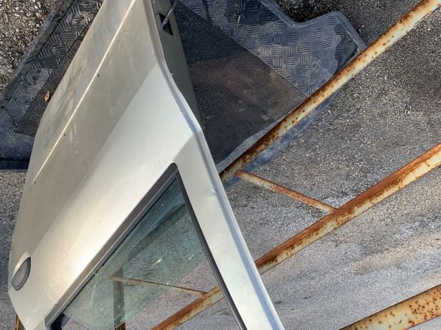 bontott DACIA LOGAN Bal hátsó Ajtó (Részeivel)