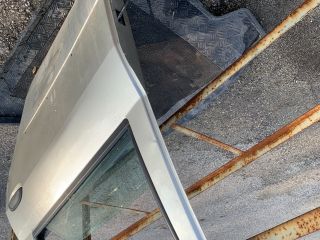 bontott DACIA LOGAN Bal hátsó Ajtó (Részeivel)