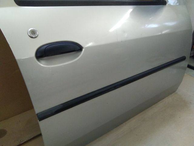 bontott DACIA LOGAN Jobb első Ajtó Díszléc