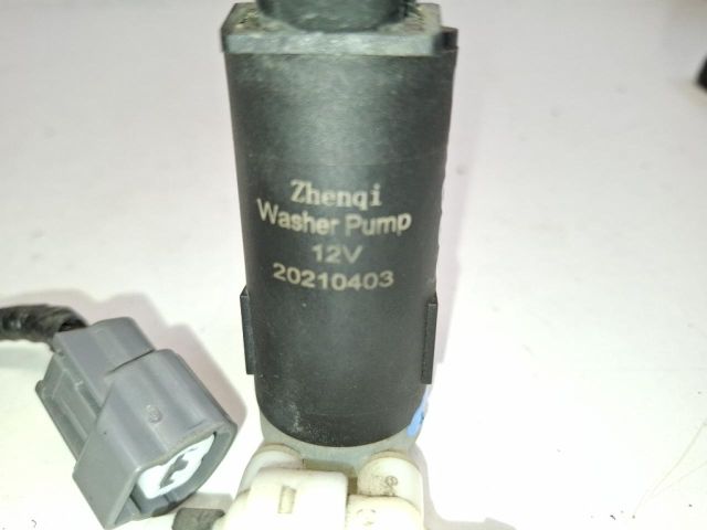 bontott DACIA SPRING Első Ablakmosó Szivattyú