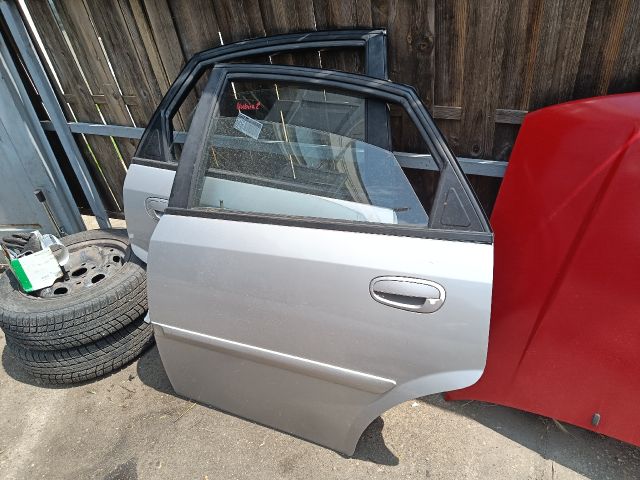 bontott DAEWOO NUBIRA Bal hátsó Ajtó (Részeivel)