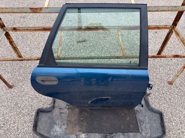 bontott DAEWOO NUBIRA Bal hátsó Ajtó (Részeivel)