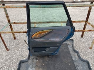 bontott DAEWOO NUBIRA Bal hátsó Ajtó (Részeivel)