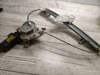 bontott DAEWOO TACUMA Bal hátsó Ablakemelő Szerkezet (Elektromos)