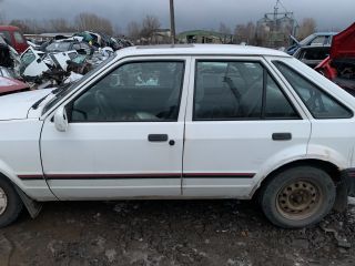 bontott FORD ESCORT Bal első Gólyaláb (Lengécsillapító, Rugó)