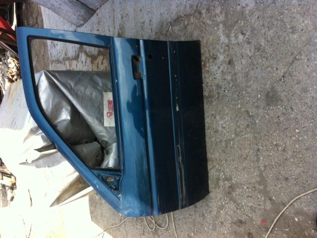 bontott FORD ESCORT Bal első Ajtó (Üres lemez)