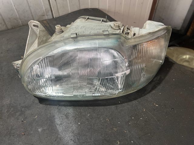 bontott FORD ESCORT Bal Fényszóró