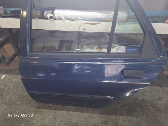 bontott FORD FIESTA III Bal hátsó Ajtó (Részeivel)