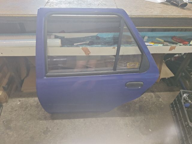 bontott FORD FIESTA IV Bal hátsó Ajtó (Részeivel)