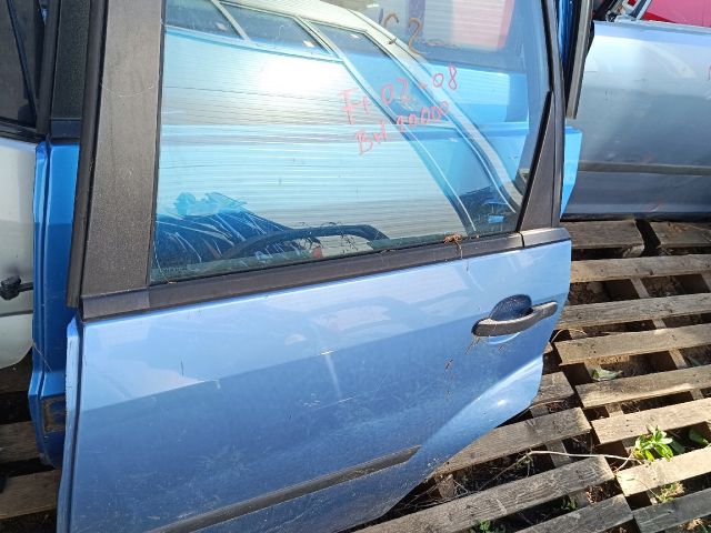 bontott FORD FIESTA V Bal hátsó Ajtó (Részeivel)