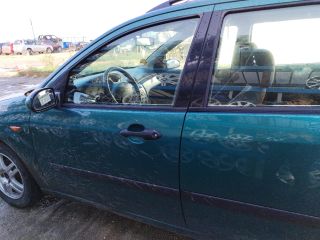 bontott FORD FOCUS I Bal első Ajtó (Üres lemez)