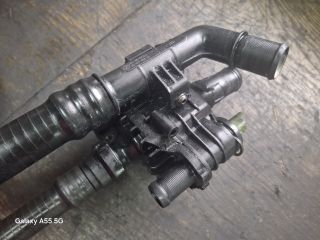 bontott FORD FOCUS II Termosztátház Csővel