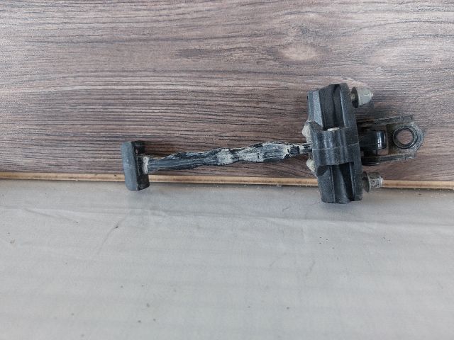 bontott FORD FOCUS III Bal első Ajtóhatároló