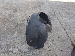 bontott FORD FOCUS III Bal első Dobbetét (Kerékjárati, Műanyag)