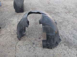 bontott FORD FOCUS III Bal első Dobbetét (Kerékjárati, Műanyag)