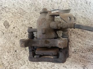 bontott FORD MONDEO IV Bal hátsó Féknyereg Munkahengerrel