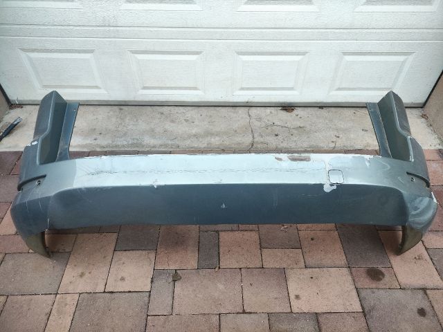 bontott FORD MONDEO IV Hátsó Lökhárító (Üresen)