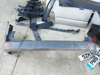 bontott FORD TRANSIT CONNECT Hátsó Lökhárító (Részeivel)