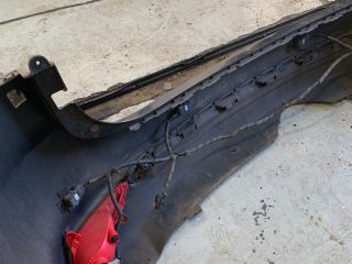 bontott KIA CARENS Hátsó Lökhárító (Részeivel)