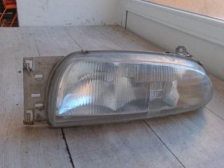 bontott MAZDA 121 Bal Fényszóró