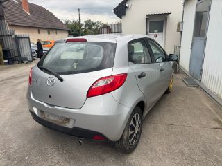 bontott MAZDA 2 Jobb hátsó Sárvédő