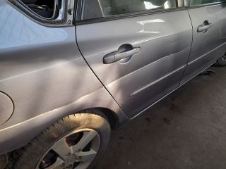 bontott MAZDA 3 Bal hátsó Rugó