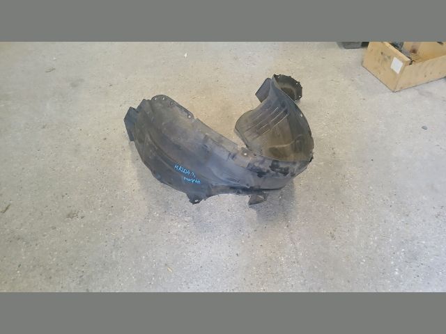 bontott MAZDA 3 Bal első Dobbetét (Kerékjárati, Műanyag)