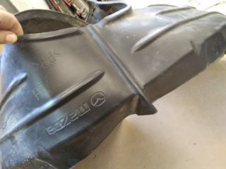 bontott MAZDA 3 Bal első Dobbetét (Kerékjárati, Műanyag)