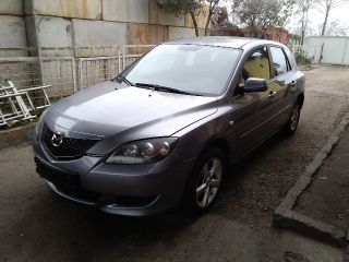 bontott MAZDA 3 Bal első Gumikéder