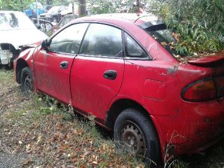 bontott MAZDA 323 Bal hátsó Rugó