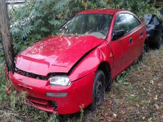 bontott MAZDA 323 Bal hátsó Rugó