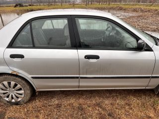 bontott MAZDA 323 Jobb első Féknyereg Munkahengerrel