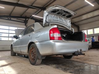 bontott MAZDA 323 Bal hátsó Fékkengyel