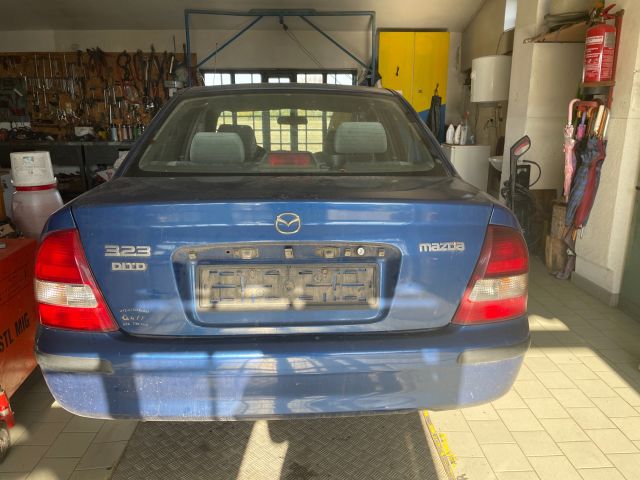 bontott MAZDA 323 Bal hátsó Rugó