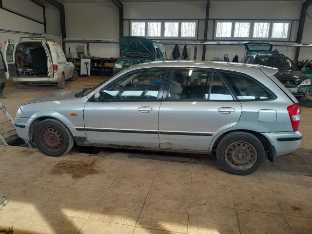 bontott MAZDA 323 Bal első Ajtó Díszléc