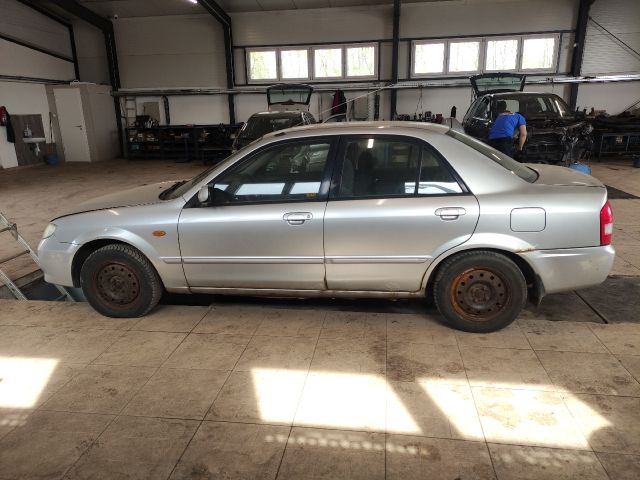 bontott MAZDA 323 Bal első Ajtó Díszléc