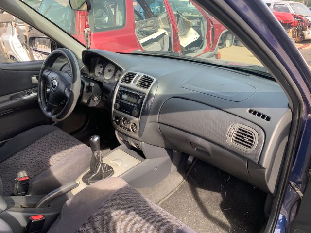 bontott MAZDA 323 Bal első Ajtó (Részeivel)