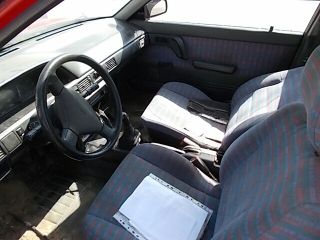 bontott MAZDA 323 Bal első Zsanér