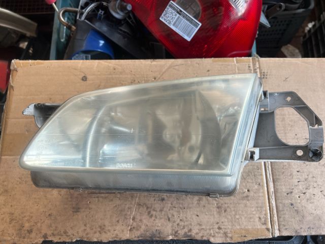 bontott MAZDA 323 Bal Fényszóró